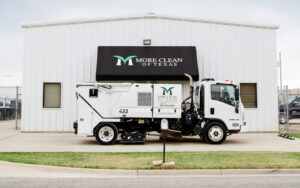 More Clean of Texas Sweeping Truck in front of More Clean of Texas